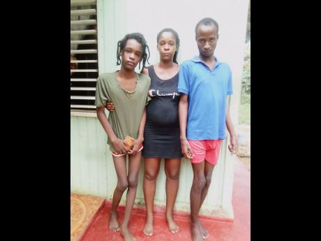 Credit: Contributed Bernadette Baker and her sons Travelle (left) and Shanaldo.