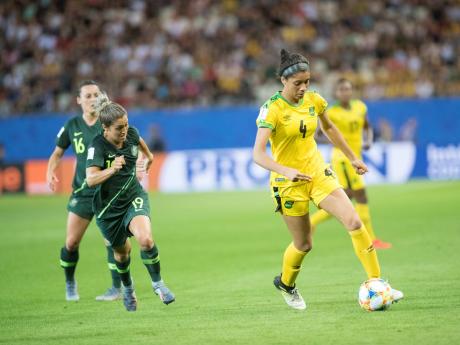 Chantelle Swaby (right) dribbles towards goal ahead of Australia’s Katrina Gorry (left) during last year’s FIFA Women’s World Cup  in Grenoble, France.