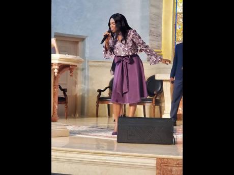 MATCHING AND MINISTERING. Gospel ambassador and entrepreneur Judith Gayle is caught up in the moment, complete with a signature two-piece outfit that will be a feature of her new clothing line with emphasis on skirts, coming soon to a boutique near you.