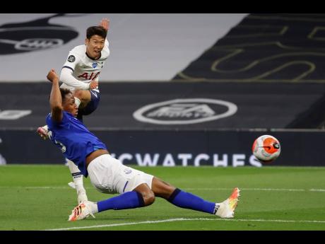 Tottenham’s Son Heung-min shoots during the English Premier League match against Everton FC at the Tottenham Hotspur Stadium in London, England, yesterday.