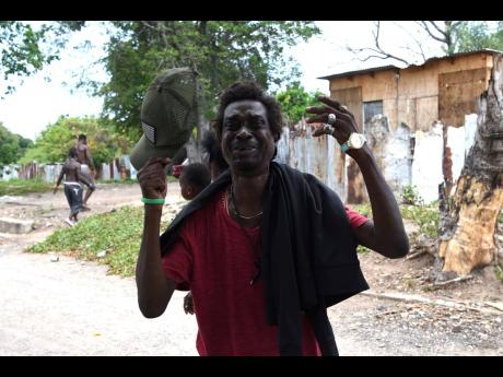 Credit: Kenyon Hemans Keith Austin is overcome with grief after hearing that his son had been shot dead.