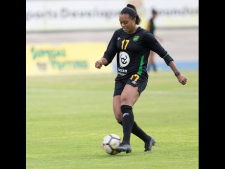 Allyson Swaby dribbles a ball during a training session with the Reggae Girlz at the National Stadium on January 18, 2019.