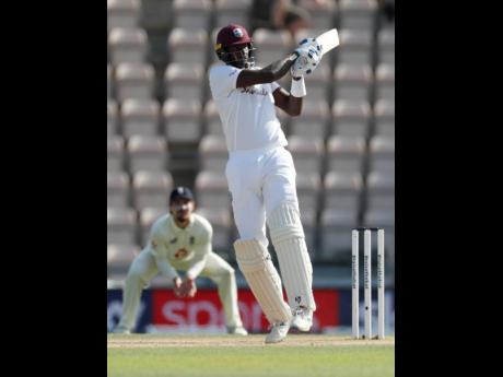 Windies captain Jason Holder bats during the fifth day of the first cricket Test match against hosts England at the Ageas Bowl in Southampton on Sunday.