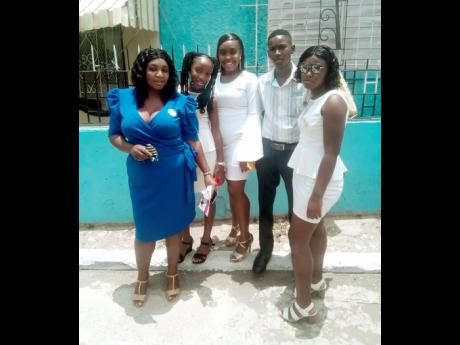 Contributed photos
Kris-Ann Martin (second left) with (from left) mother Tamika Wilson, and siblings Rushana Richards, Christopher Martin, and Adrianna Richards.