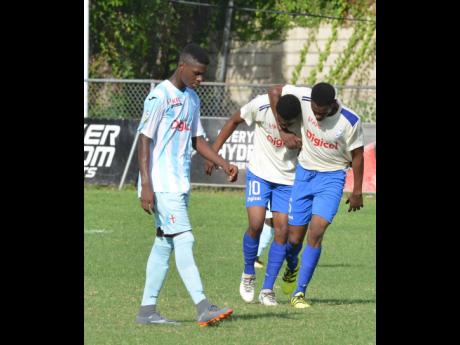 Members of the Kemar Brown- coached Cumberland High School Manning Cup team celebrate after scoring a goal against St George’s College in the first round of the ISSA/Digicel Manning Cup football competition in 2018.