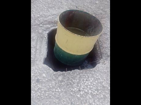 Credit: Simone Morgan-Lindo A drum has since been placed in the manhole.