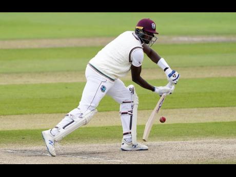 Credit: Jon Super West Indies captain Jason Holder bats during the last day of the second Test match against England at Old Trafford in Manchester, England, on Monday, July 20.
