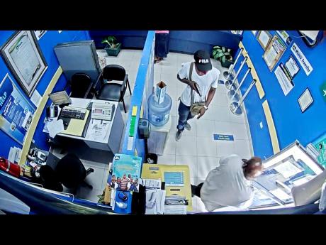 Camera footage shows the robbery in progress at the JN Bank branch in Whitehouse, Westmoreland, on Tuesday.