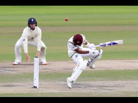 West Indies’ Shane Dowrich evades a rising delivery from England’s Jofra Archer during the fifth day of the third cricket Test match between England and West Indies at Old Trafford in Manchester, England, Tuesday, July 28, 2020.