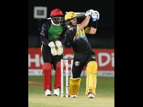 Jamaica Tallawah batsman Glen Phillips hits a six during his innings of 85 against the St Kitts and Nevis Patriots in a Caribbean Premier League (CPL) cricket match at Sabina Park on Thursday, September 19, 2019.