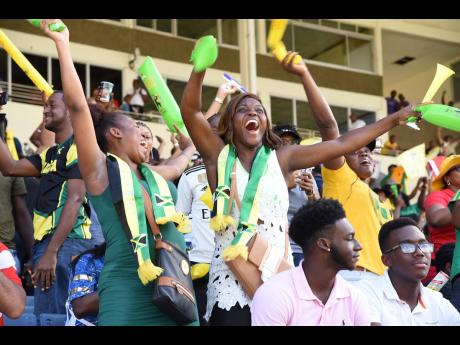 FILE
Supporters of the Jamaica Tallawahs celebrate their team’s first win of the 2019 Caribbean Premier League campaign after they defeated the  Barbados Trident at Sabina Park on Sunday, September 15, 2019.