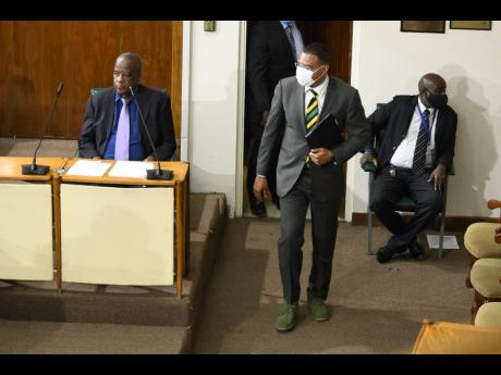 Credit: Rudolph Brown Prime Minister Andrew Holness in his Clarks shoes in Gordon House.