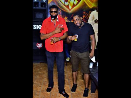  Father Wee Pow (left) with producer Earthman at Weddy Weddy Wednesdayz, at Stone Love Headquarters at 41 Burlington Avenue, in Half-Way-Tree, St Andrew earlier this month.