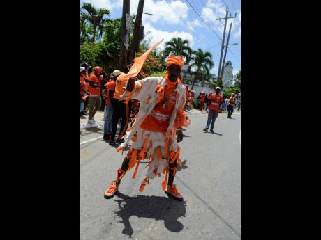 This man, dubbed General Chief, came out in his creative PNP design, dancing and chanting at the Chapelton Family Court, Main Street, Chapelton, in the Clarendon North Central constituency.