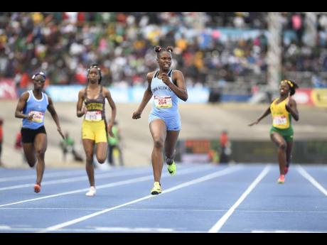 FILE
Kevona Davis of Edwin Allen wins the Class Two girls 200m finals with a record time of 22.72 on March 24, 2018.

ISSA/Grace Kennedy Boys and Girls Champs 2018 held at The National Stadium in Kingston on Saturday March 24, 2018

 *** Local Caption *** Gladstone Taylor / Photographer

Kevona Davis of Edwin Allen (second right) wins the Class 2 girls’ 200m finals in a record time of 22.72 at the SSA/GraceKennedy Boys and Girls’ Athletics Championships at the National Stadium  on Saturday March 24, 2018.
