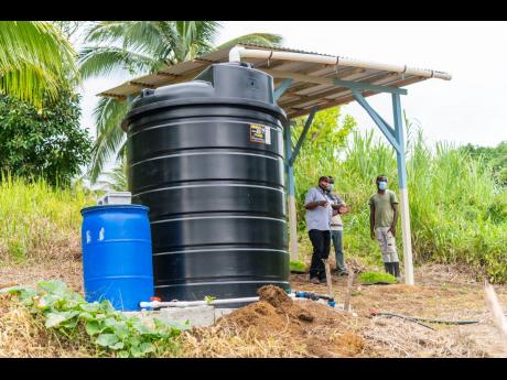 The rainwater harvesting system that was donated by Sean Paul Foundation and Food For The Poor Jamaica. 