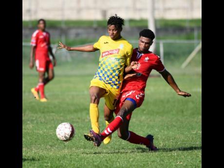Harbour View’s Peter-Lee Vassell dribbles past UWI’s Patrick Brown in a Red Stripe Premier League encounter at the UWI Bowl on Thursday September 20,2018.
