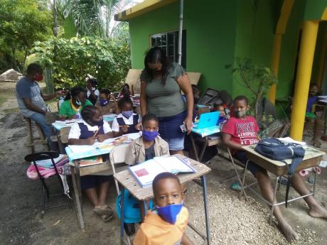 Camille and Garnet Foster have opened their home to children in their community who were in need of a place to access the Internet and get educational instructions.
