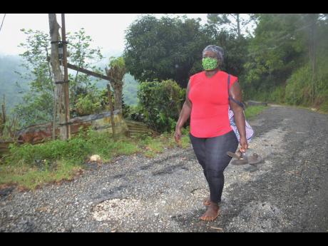 Donna Emmanuel-Mitchell on her five-mile journey from Bethel Gap to her Albion Mountain in St Thomas on Wednesday.