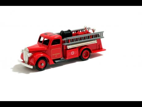 Credit: Daemion McLean got a toy fire truck as a Christmas present at age 19.