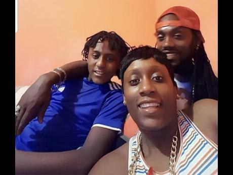 Jus Chris (right), his son Janai and Sherane Morgan, the late mother of his 18-year-old son. 