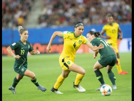 File
Jamaica’s Chantelle Swaby (right) dribbles away from Australia’s Katrina Gorry in a FIFA Women’s World Cup match.