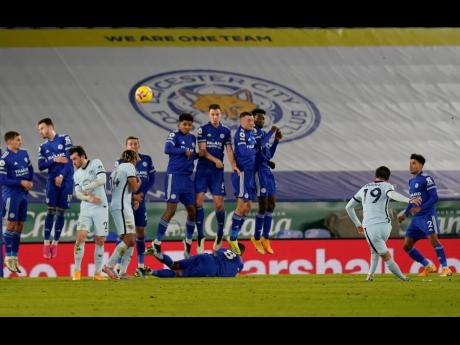 Chelsea’s Mason Mount shoots during the English Premier League match between Leicester City and Chelsea at the King Power Stadium in Leicester, England, yesterday.