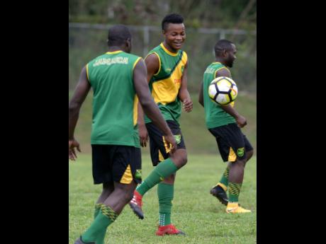 Credit: File FILE
National player Javain Brown (centre) takes part in a training session with the Jamaica Under-23 team.