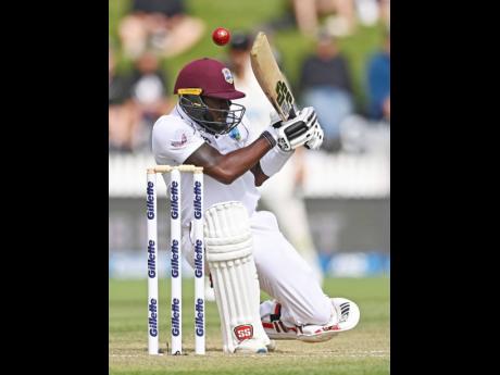 West Indies’s Jermaine Blackwood has the ball fly over his head while batting against New Zealand during play on day three of their first cricket test in Hamilton, New Zealand, Saturday, December 5, 2020. 