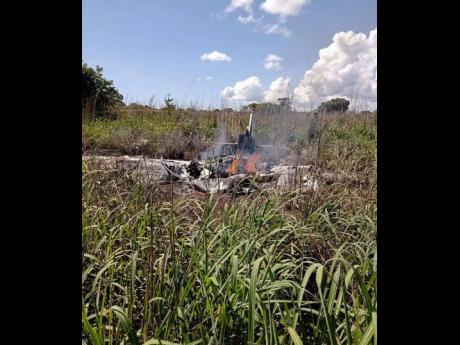 Credit: contributed Scene of a plane crash which killed four football players in Brazil yesterday.