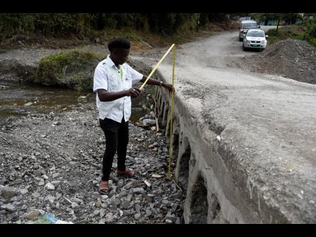  Clifton ‘Cliff Twang’ Brown says the Robertsfield ford in St Andrew needs to be desilted constantly in order to prevent it being flooded when the Yallahs River is in spate.