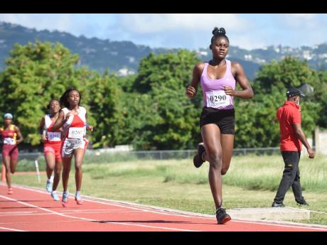 Vere Technical High School’s Amanda Thrue wins the Class One Girls 800m race at the Tyser Mills Classics at Calabar High School on Saturday, December 12, 2020.