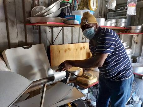 Credit: Roxroy McLean Roderick ‘Winston’ Frazer operates his business on Pechon Street in downtown Kingston.