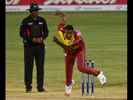 Obed McCoy bowls a delivery as he put together a spell of two wickets for 25 runs against Sri Lanka in the first T20I yesterday.