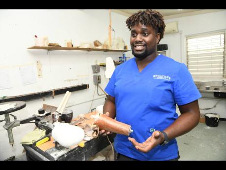 Lasana Pryce, a prosthetic technician at Surgix Jamaica, which is located at Sir John Golding Rehab Centre Mona.