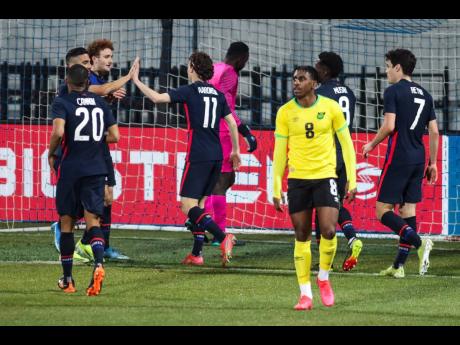US players celebrate after scoring their second goal during the international friendly soccer match between USA and Jamaica at SC Wiener Neustadt stadium in Wiener Neustadt, Austria, Thursday, March 25, 2021. 