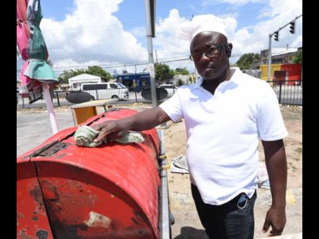 Verol Scarlett, a pan chicken vendor who operates from the Naggo Head taxi stand in Portmore, St Catherine.