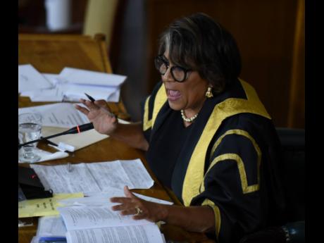 Speaker of the House, Marisa Dalrymple-Philibert addresses Parliament. 