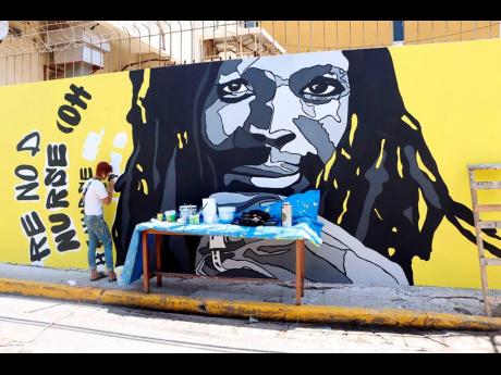 The Mark Lane, downtown Kingston, murals pay homage to some of the pioneers of reggae music.