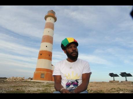 Credit: File Internationally renowned entertainer, Bush Man, who is a son of St Thomas, sits in front of the Morant Point Lighthouse in the parish.