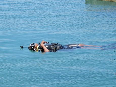 Jay James relaxing on the water at the Oracabessa Bay in St Mary.