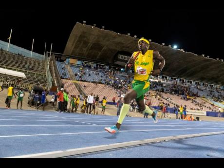 Kemarley Baker of St Jago enters the first bend on the final leg of the men 4 x 400m relay open at the Queen’s/Grace Jackson Meet 2019 held at the National Stadium on Saturday January 26, 2019.