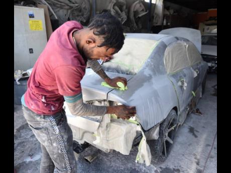 Credit: Ian Allen Kevin Wilson is hard at work.