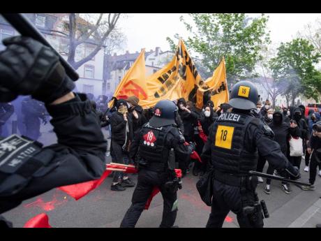 Police and demonstrators clash during the “Revolutionary May Day Demonstration” in Frankfurt on Saturday.