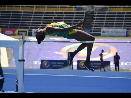 St Jago High School’s Shantae Foreman clears the bar during the Class One girls’ high jump final on day one of the 2021 ISSA/GraceKennedy Boys and Girls’ Athletics Championships yesterday. 