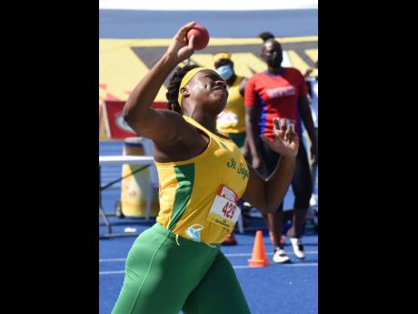 St Jago High School’s Jamora Alves in action in the Class One Girls shot put final at the ISSA/GraceKennedy Boys and Girls’ Athletics Championships at the National Stadium in Kingston yesterday.