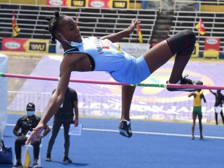 Edwin Allen High School’s Asia McKay on her way to victory in the Class Four Girls high jump in the ISSA/GraceKennedy Boys and Girls’ Athletics Championships at the National Stadium last Friday.