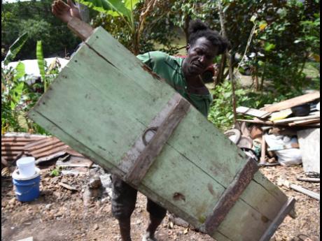 Blake assists the workmen in the construction.
