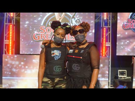 DJ Nelly Swagg (left) and DJ Naz celebrate their win in the first round of the Guinness Sounds of Greatness competition.