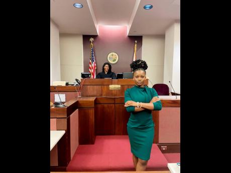 Credit: Contributed Marie Rattigan, with Judge Tiffany Baker-Carper in the background.